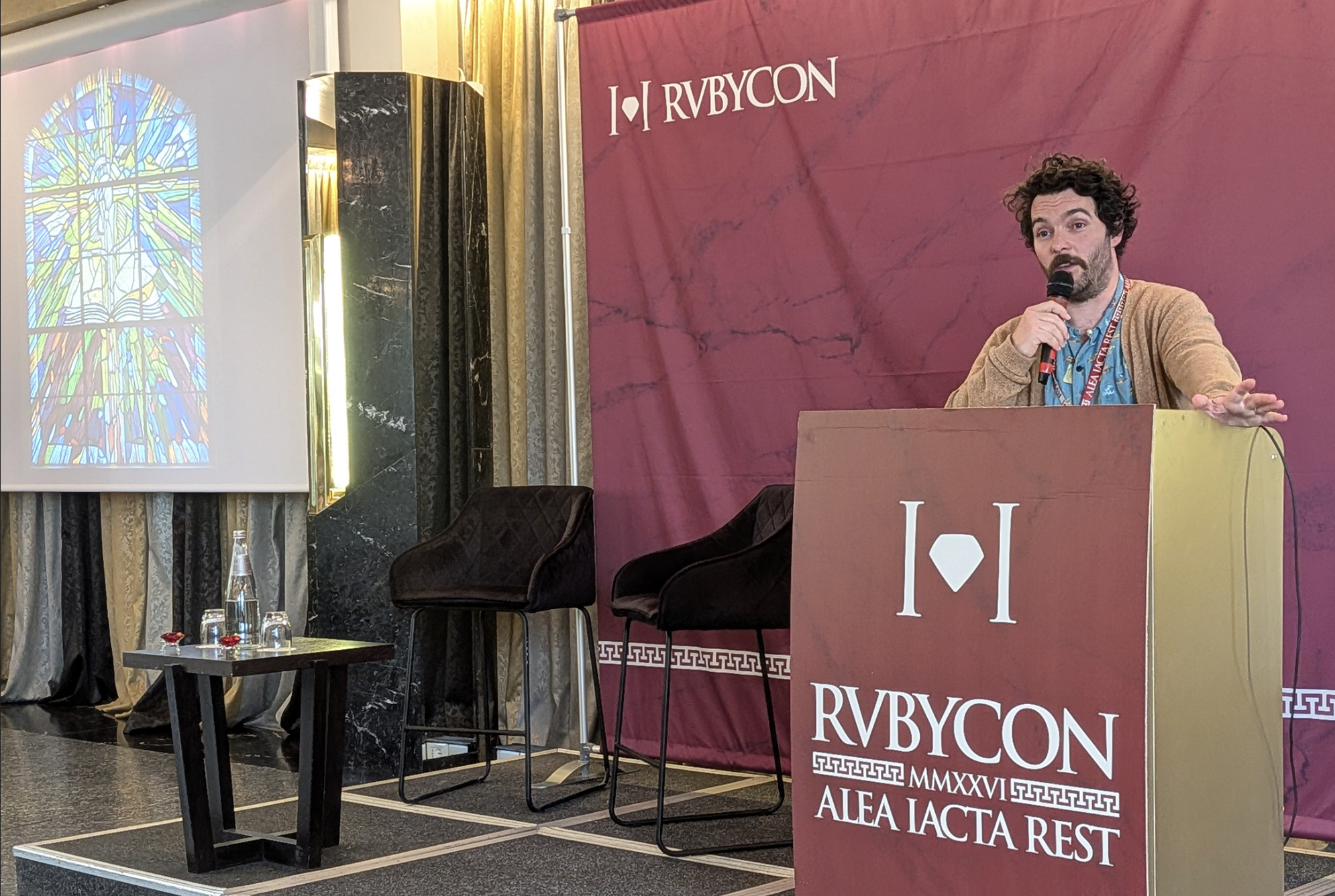 a picture of Remi speaking at Rubycon conference 2026
