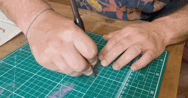me doing a curved cut on glass