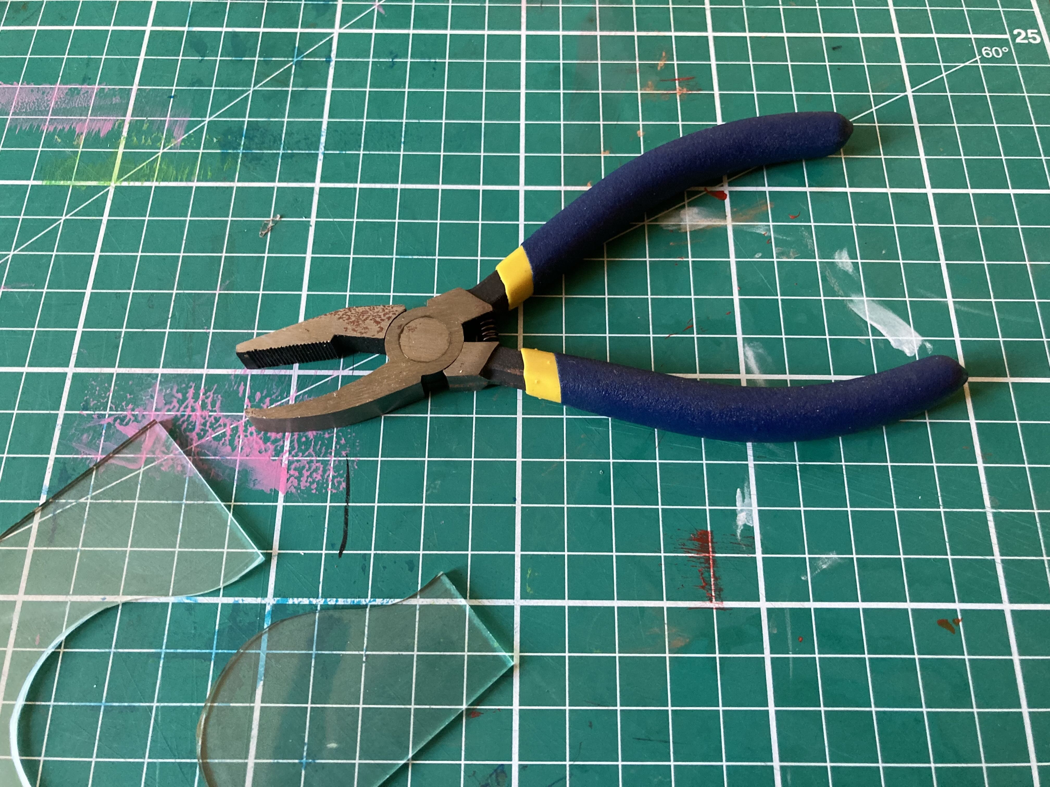 a pair of three-bladed scissors