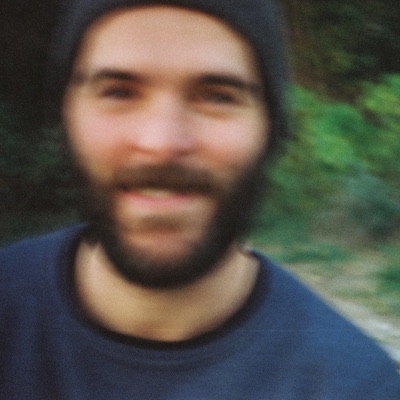 A out-of-focus pictire of my face shot by my kiddos